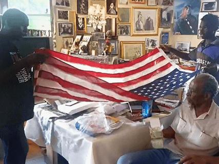 https://bit.ly/Lawrence-flag-folding